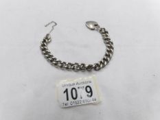 A silver chain with padlock, approximately 40 grams.