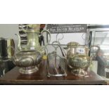 A mixed lot of silver plate including tea pot. coffee pot, toast rack etc.