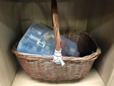 A wicker basket & contents including cotton reels etc.