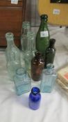 A collection of old bottles including Lincoln related, Arnold & Co.