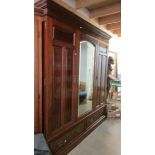 A good quality mahogany combination wardrobe.