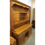 A good pine dresser. ****Condition report**** The dresser splits.