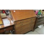 A mahogany bureau.