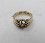 An 18ct gold ring set diamond, size O.