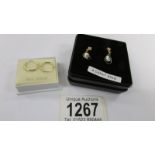 2 pairs of 9ct gold earrings.