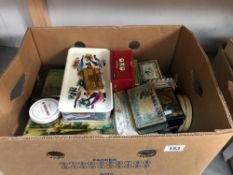 A collection of old tins & boxes
