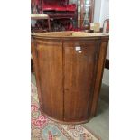 A good oak corner cupboard.