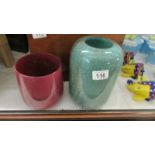 A pottery vase and a planter.