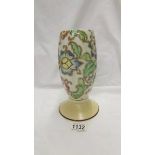 A Tuscan Decord pottery 9" tall vase on a yellow/cream foot with floral style decoration (art