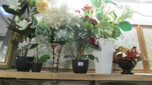 A quantity of artificial flowers and plants.