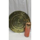 An Army & Navy stores copper flask and a large brass wall plaque depicting a coat of arms.