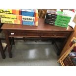 A 2 drawer mahogany side table.