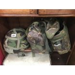 A camouflage helmet and other camouflage items.