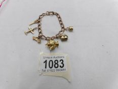 A 9ct gold charm bracelet, 22 grams.