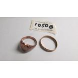 A 9ct gold signet ring and a 9ct gold wedding ring. 4.6 grams.