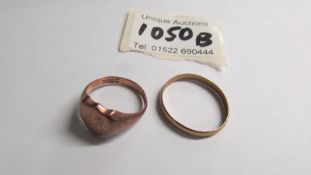 A 9ct gold signet ring and a 9ct gold wedding ring. 4.6 grams.