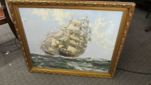A large gilt framed and glazed print 'Ariel & Taeping' by Montague Dawson.