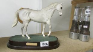 A Royal Doulton figure of Desert Orchid,