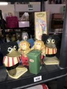 A collection of old toys including monkeys