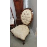 A Victorian mahogany framed nursing chair.