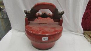 A Chinese lidded bucket.