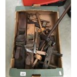 A box of old woodworking tools