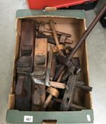 A box of old woodworking tools