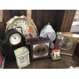 7 assorted clocks.