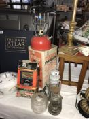 An interesting selection of Tilley lamps and battery charger ****Condition report****