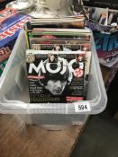 A box of miscellaneous music magazines including Record Collector, Mojo, Total Guitar etc.