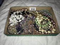 A mixed lot of necklaces & bracelets including pearls etc.