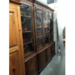 A mahogany 4 door cabinet