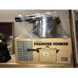 A boxed Presto Pressure Cooker (never been out of box)