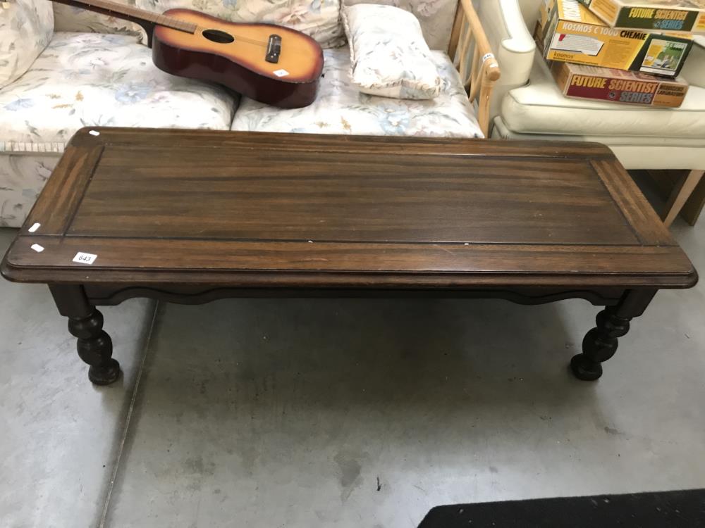 A mahogany coffee table.