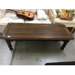 A mahogany coffee table.