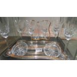 3 contemporary glass dishes and 2 champagne flutes.