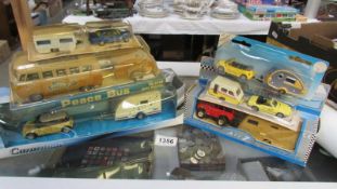 6 boxed die cast cars with caravans - Mini, VW camper etc.