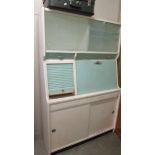 A 1950's kitchen cabinet.