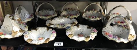 A quantity of Continental porcelain floral dishes & baskets (A/F)