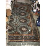 An interesting old carpet ****Condition report**** Approximate size not including