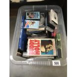 A quantity of miscellaneous music cassettes, videos and books, Abba, Nat King Cole etc.
