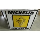 A Michelin metal sign.