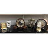 A collection of clocks including Westminster chime & Schatz 400 etc.
