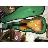 An old violin in case a/f