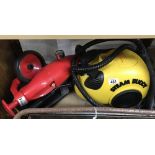 A Steam Buddy steam cleaner