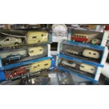 6 boxed die cast cars with caravans, - Mini Cooper, Mercedes Benz, VW camper etc.