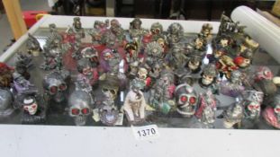A large quantity of skulls and skeleton ornaments including Leonardo Legends and Dreams (in excess