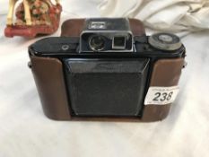 A vintage leather cased Agilux camera