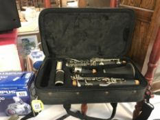 A cased Prelude Conn-Selmer clarinet.