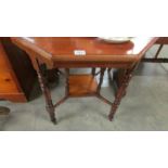 A mahogany octagonal occasional table.